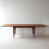 Vintage teak table by ISA Bergamo with drop-leaf extensions