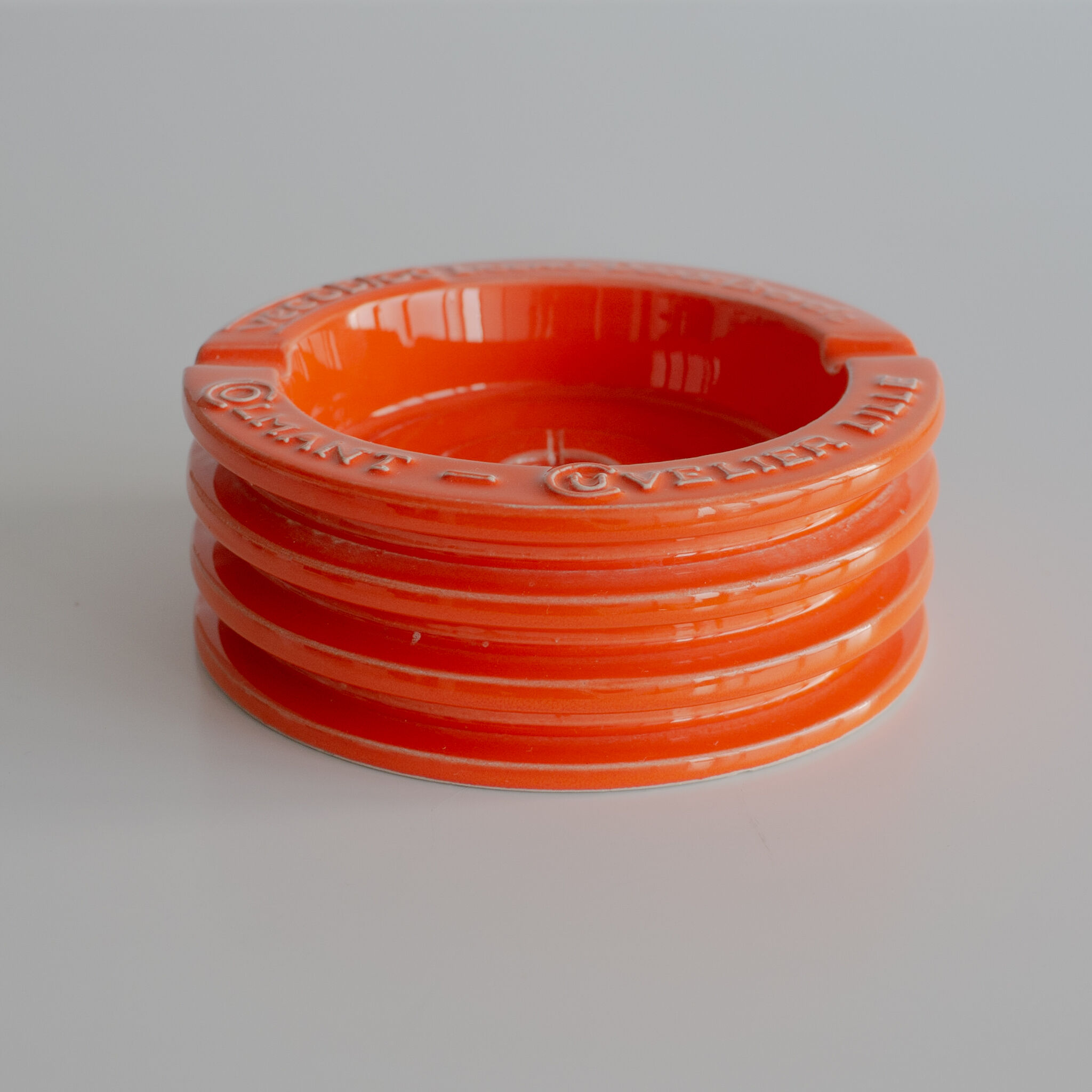 Orange ceramic ashtray