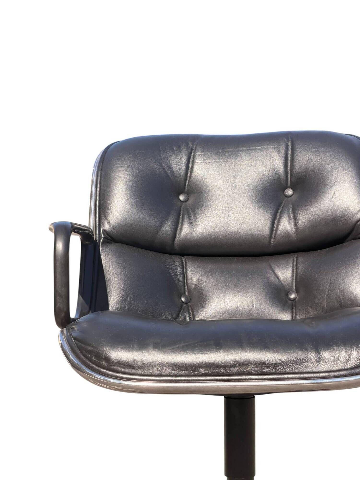 Charles Pollock Executive Knoll office chair in black leather.