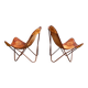 Set of 2 vintage Butterfly chairs in brown leather with a metal frame.