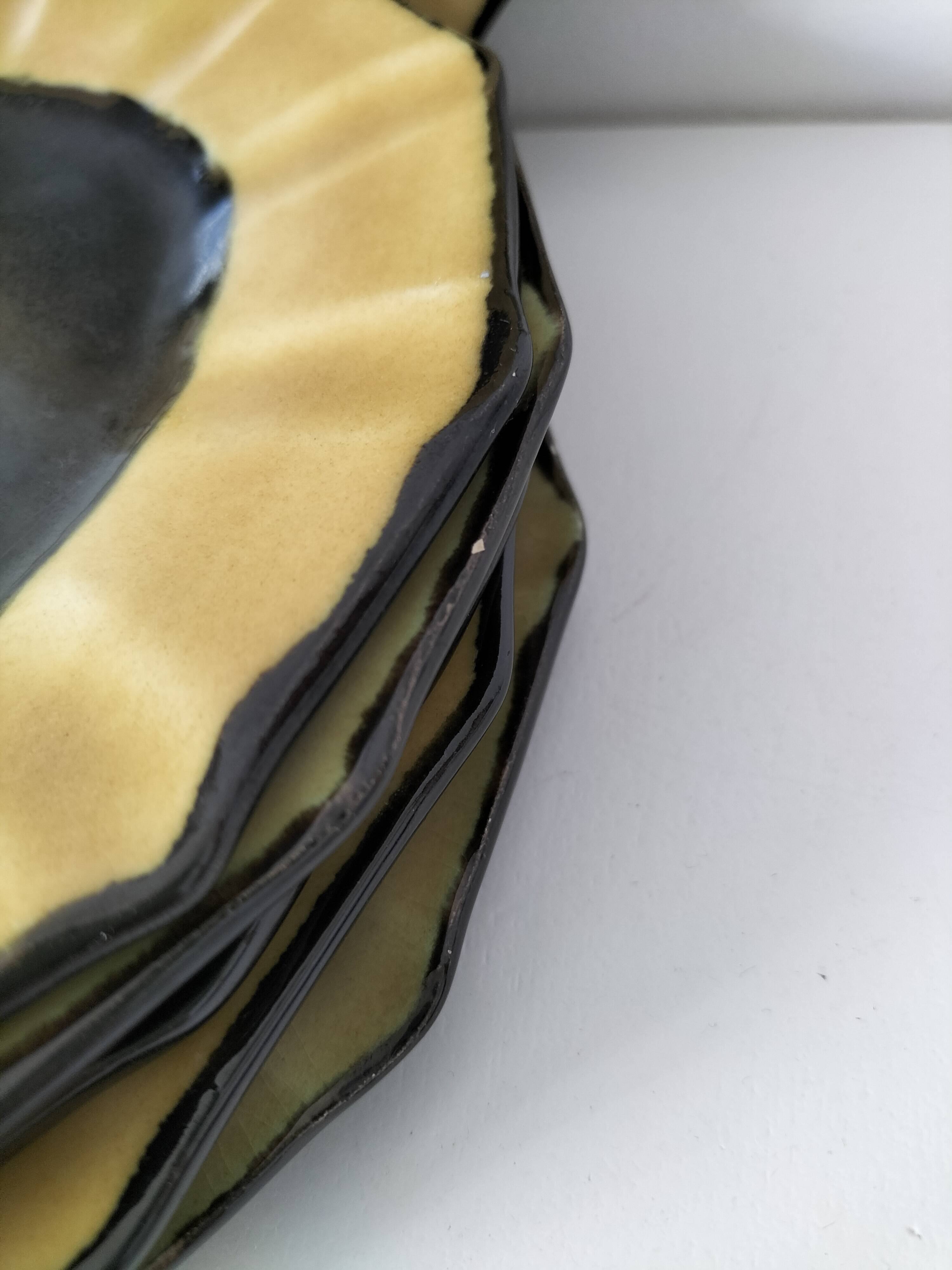 6 ceramic dessert plates shaped like a sunflower, signed CB.