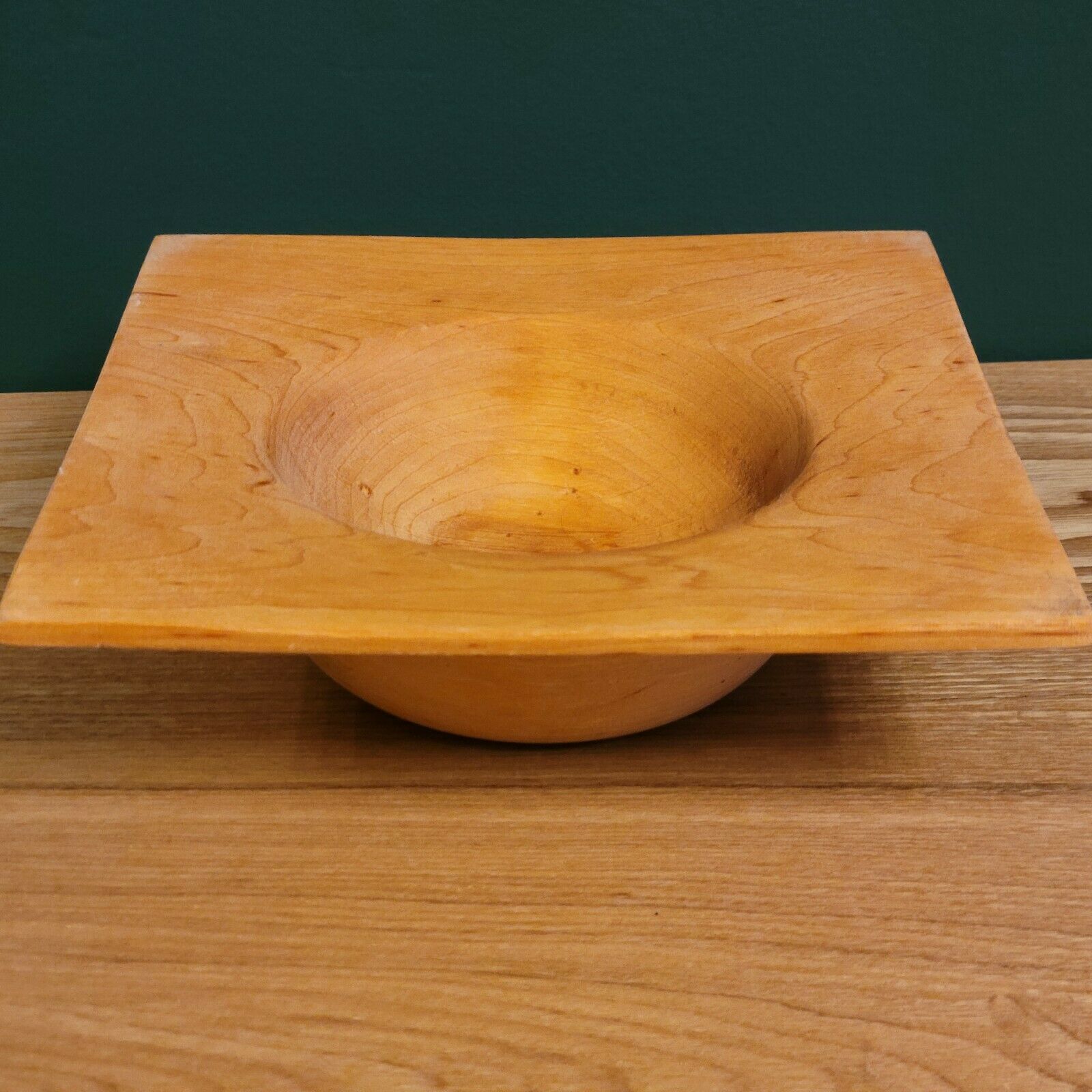 2 flared bowls in square and round wood