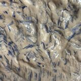 Blue and white ceramic snail