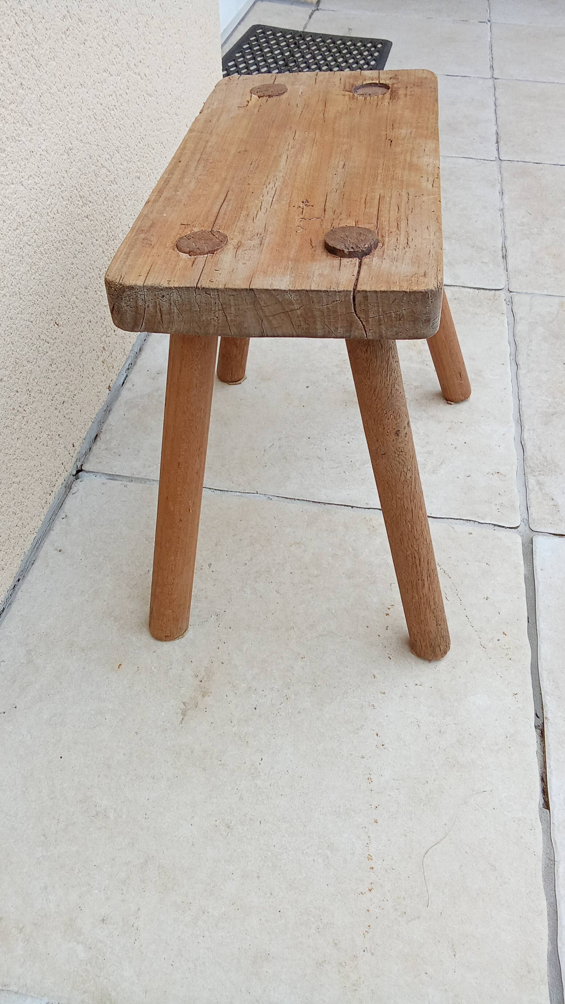 Vintage old wooden farmhouse stool treated brutalist