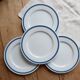 4 vintage Lustucru plates in porcelain with a blue checkered pattern.
