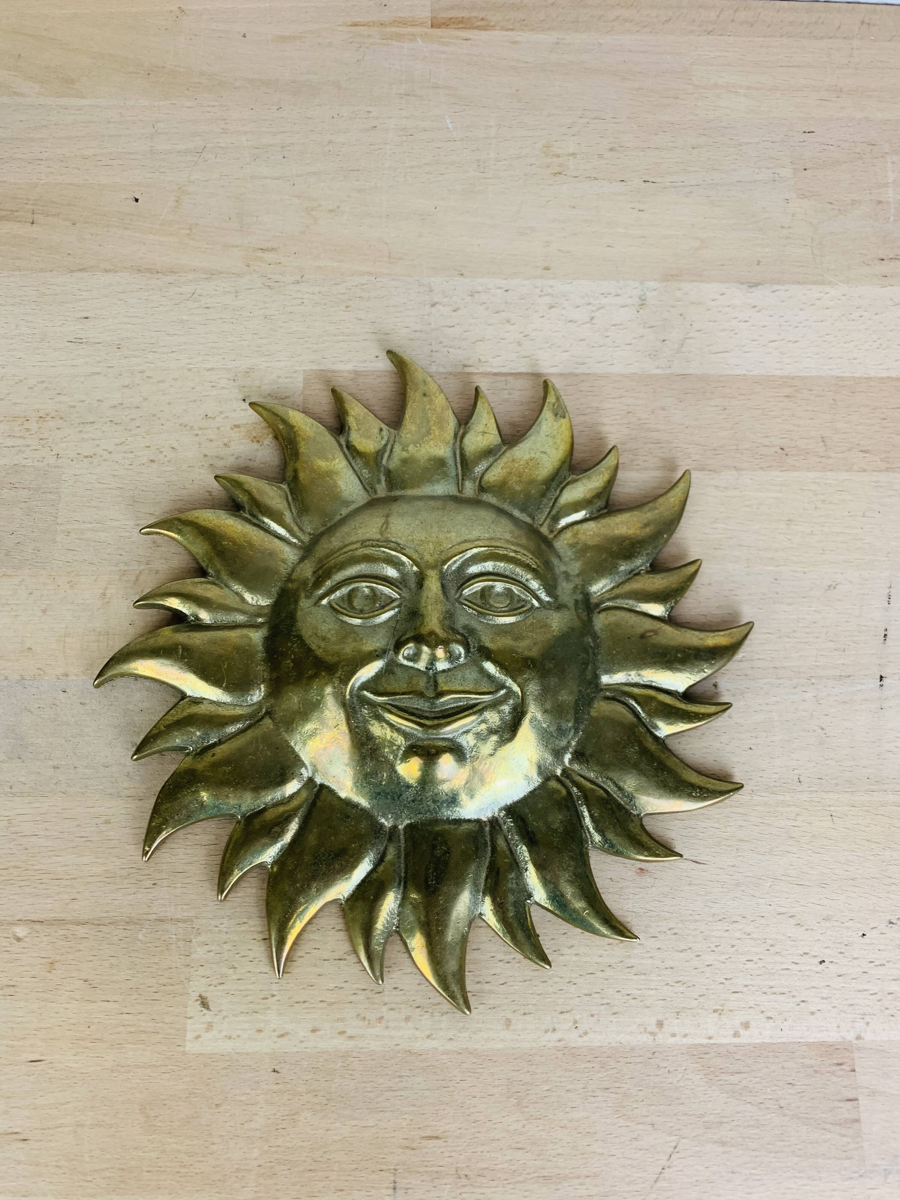 Vintage solid brass sun wall sculpture