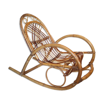 Old vintage rattan rocking chair for kids
