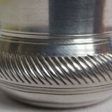 Old silver metal timbale with punch