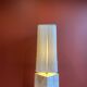 Beige marble stucco base, Houles white ecru fringed lampshade.