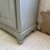 Blue patinated cap cabinet