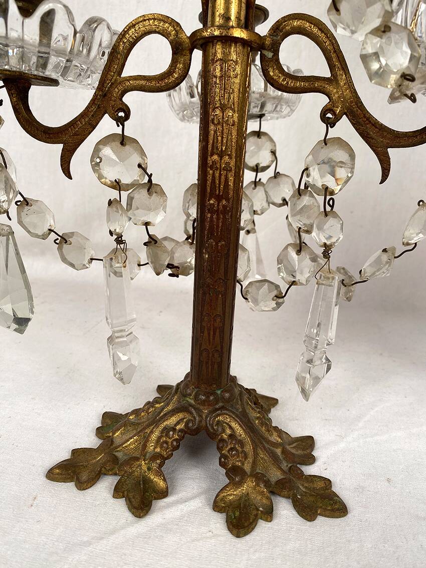 Pair of candlesticks with tassels and flowers in white porcelain