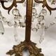 Pair of candlesticks with tassels and flowers in white porcelain