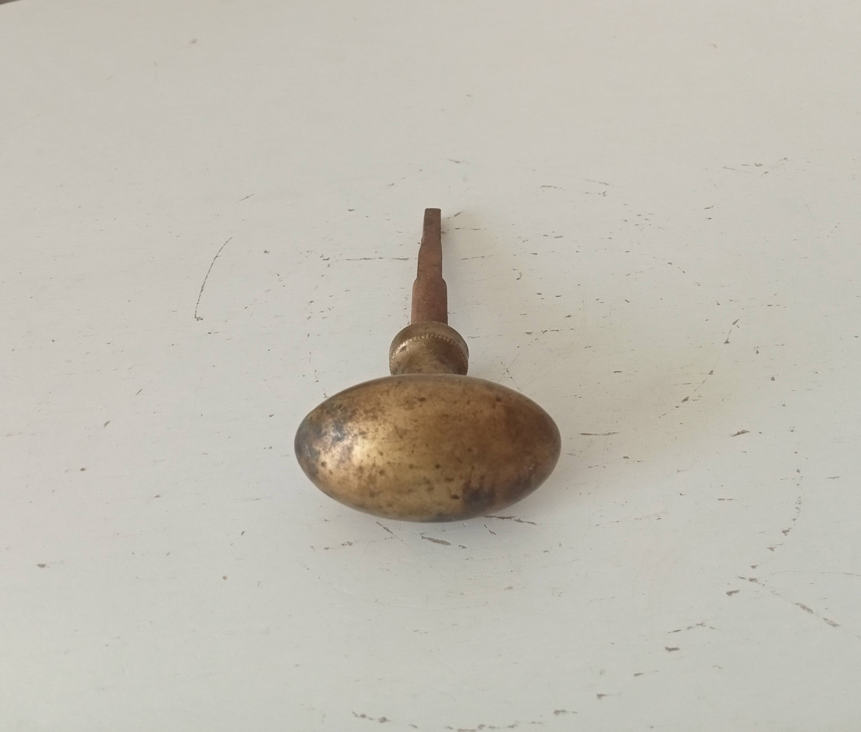 Antique olive door handle from the 19th century.