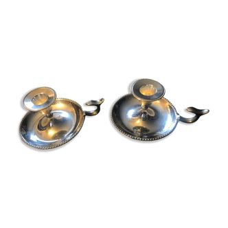 Pair of silver metal hand candle holders