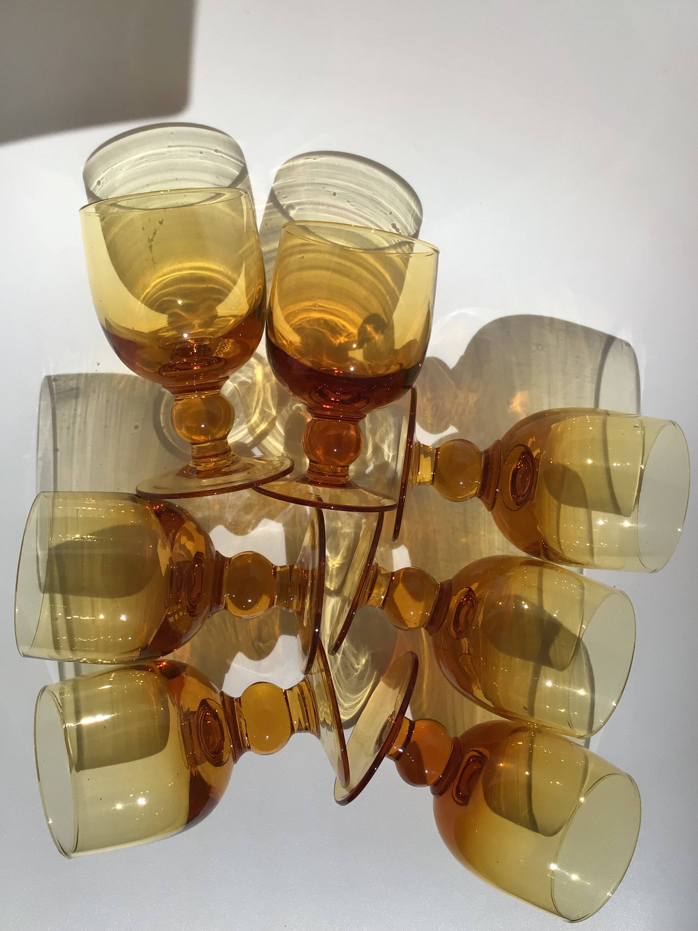 7 Amber stemmed glasses
