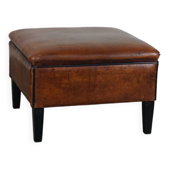 Beautifully sized sheepskin leather ottoman with a gorgeous warm color