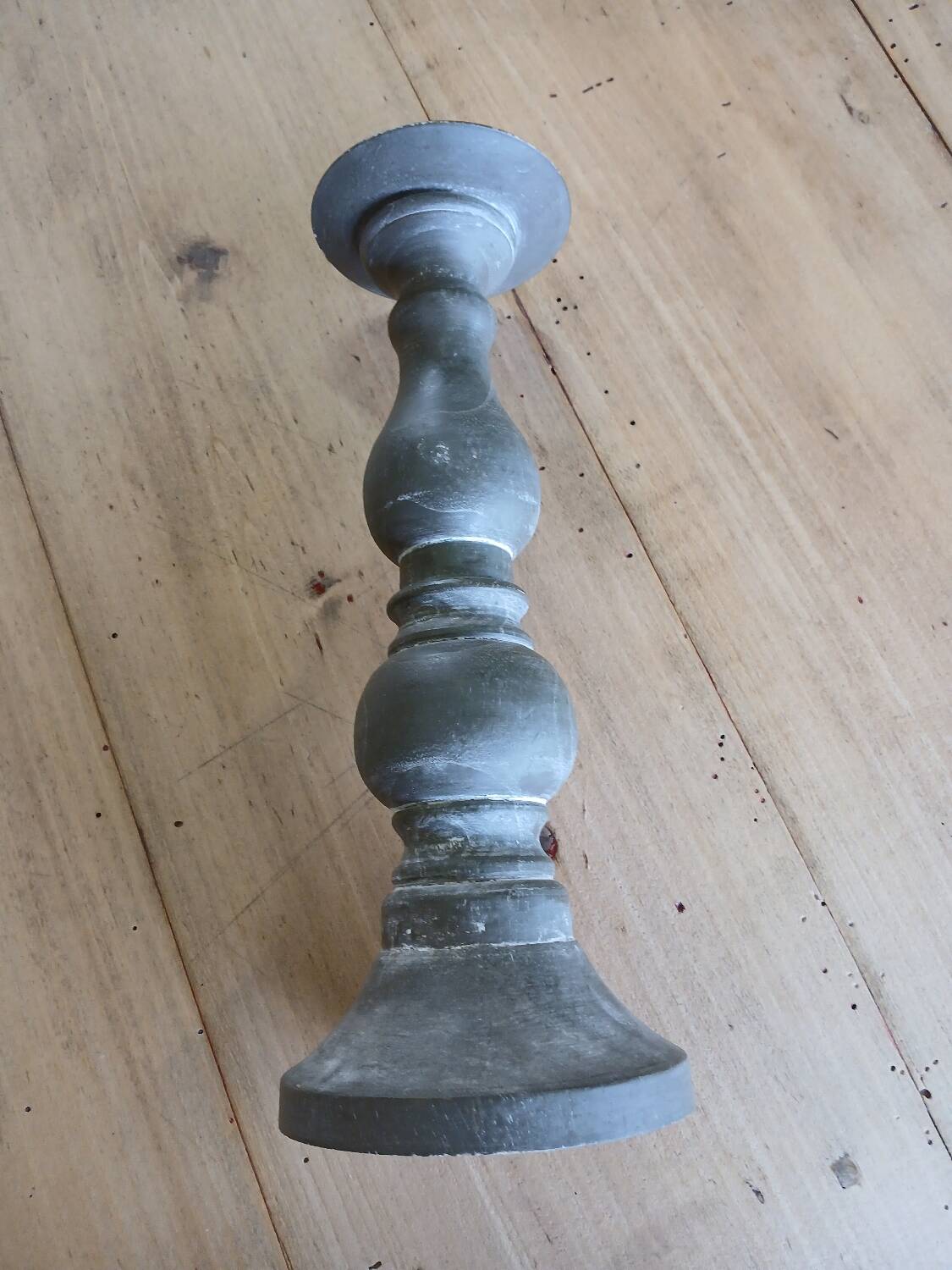Candle holder in patinated wood
