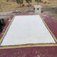 Large Moroccan Berber rug in cream 400x250 cm – yellow and blue border