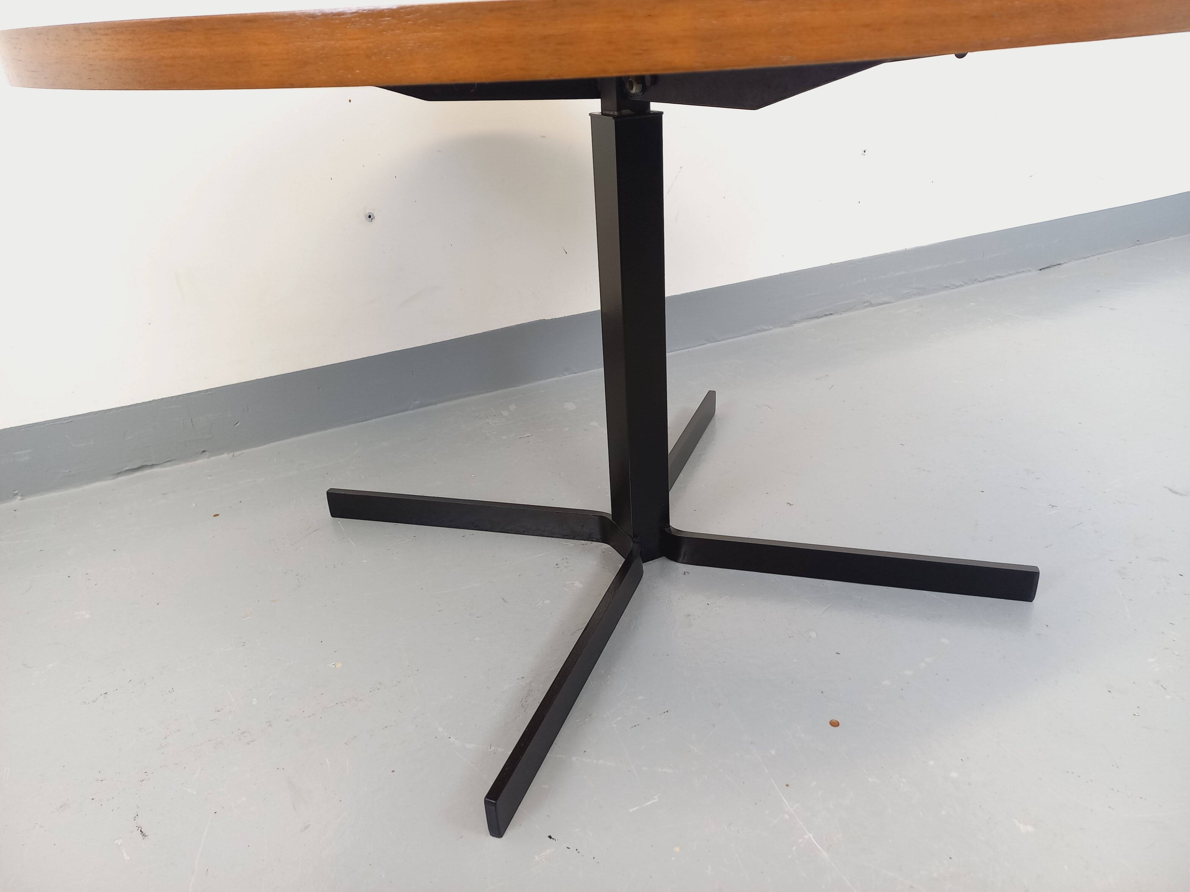 Large round coffee table in vintage Scandinavian style, modular into a table.