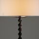 Twisted black metal brutalist floor lamp