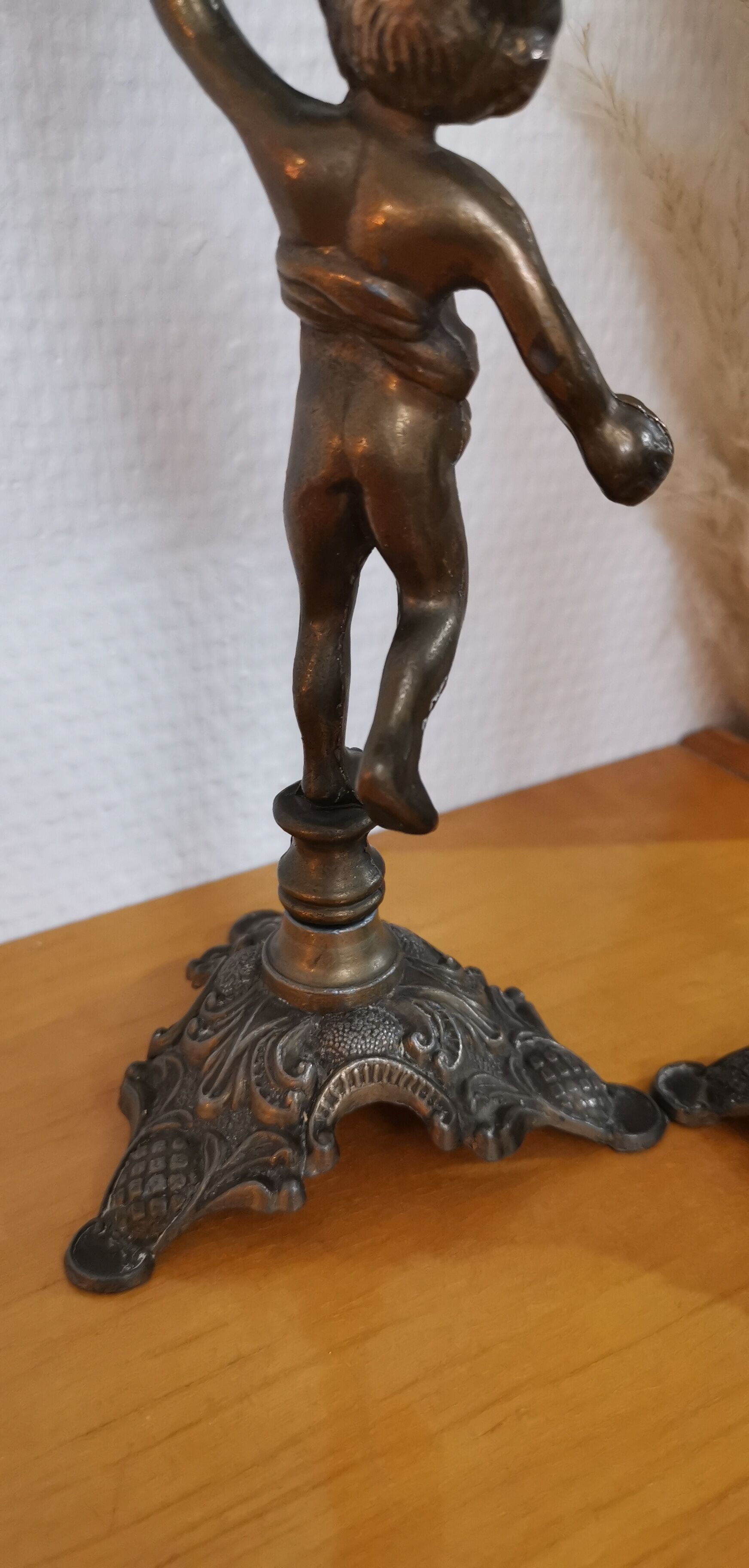 Pair of antique candlesticks in bronze and brass