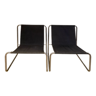 Pair of tubular steel armchairs by Claude Courtecuisse