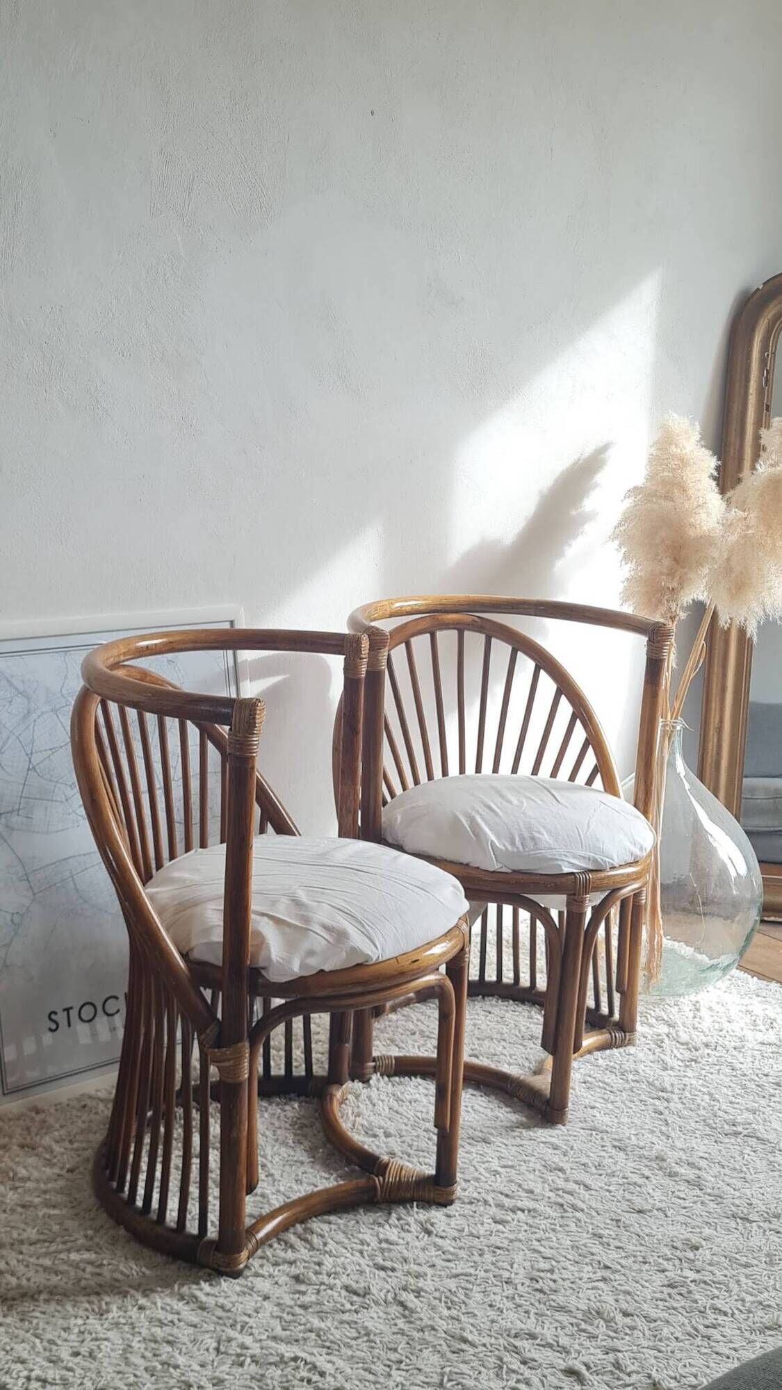 Pair of vintage rattan armchairs circa the 1960s.