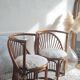 Pair of vintage rattan armchairs circa the 1960s.