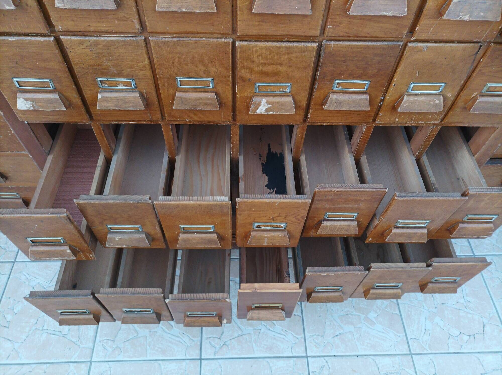 Apothecary or trade cabinet in fir with 53 drawers.
