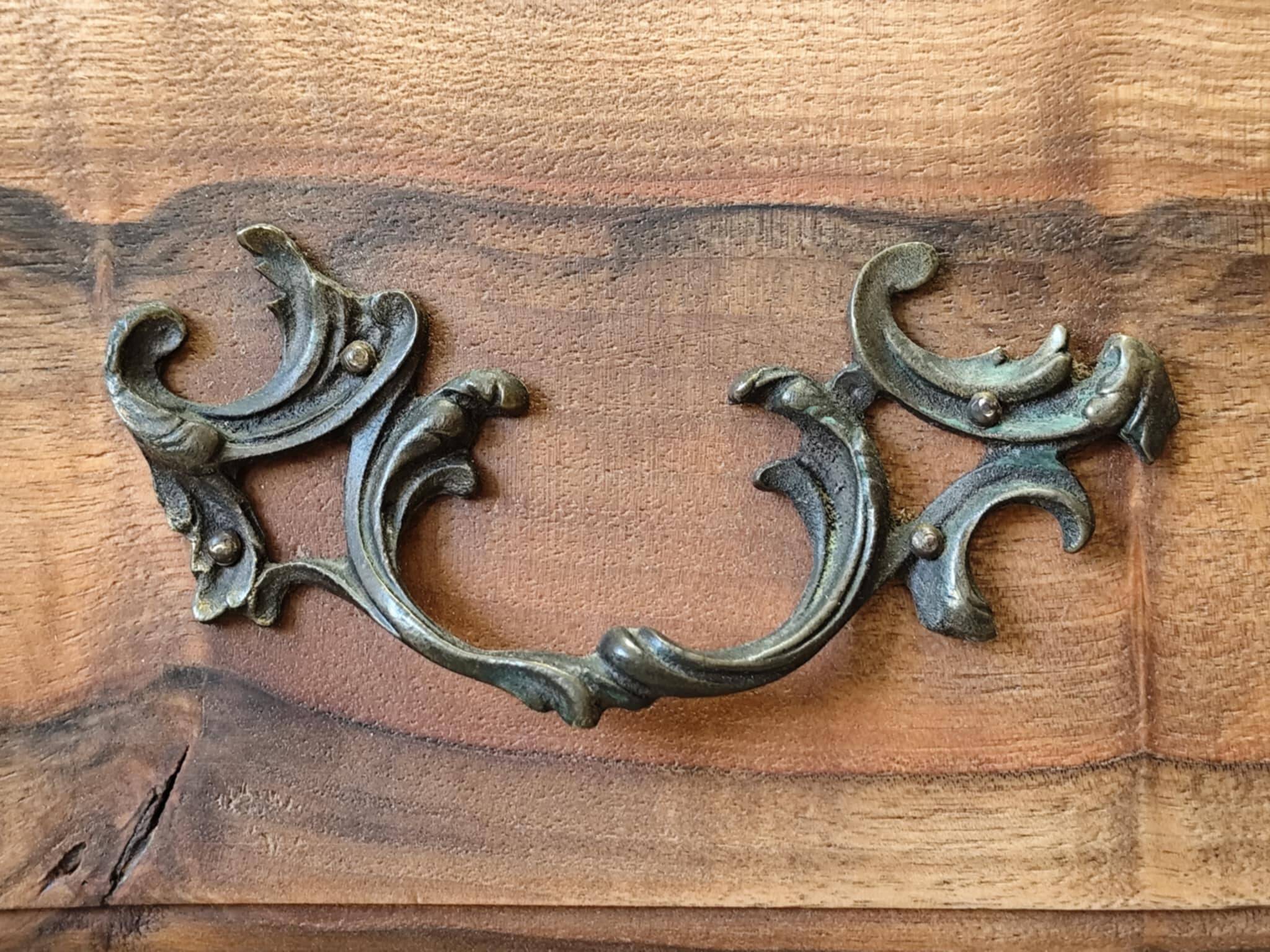 Walnut crossbow chest of drawers