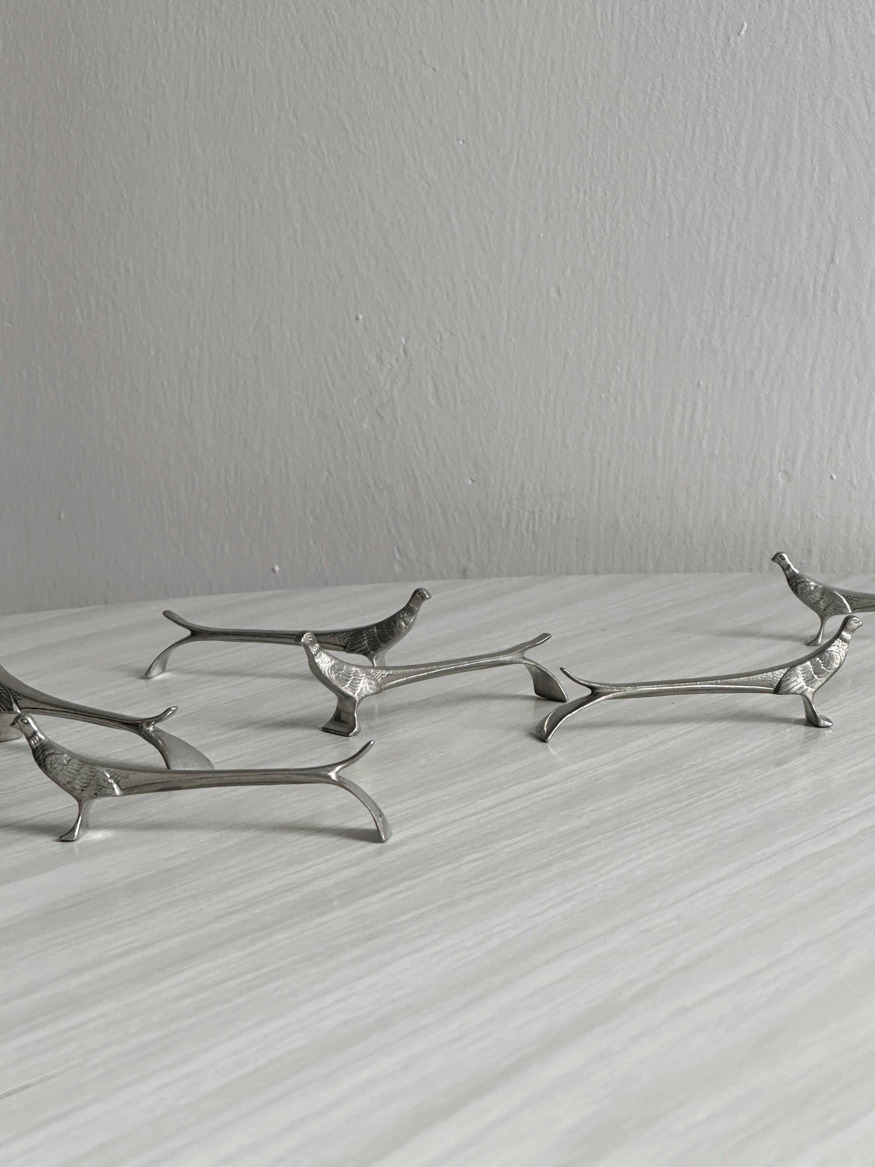6 silver metal knife holders, pheasant shape