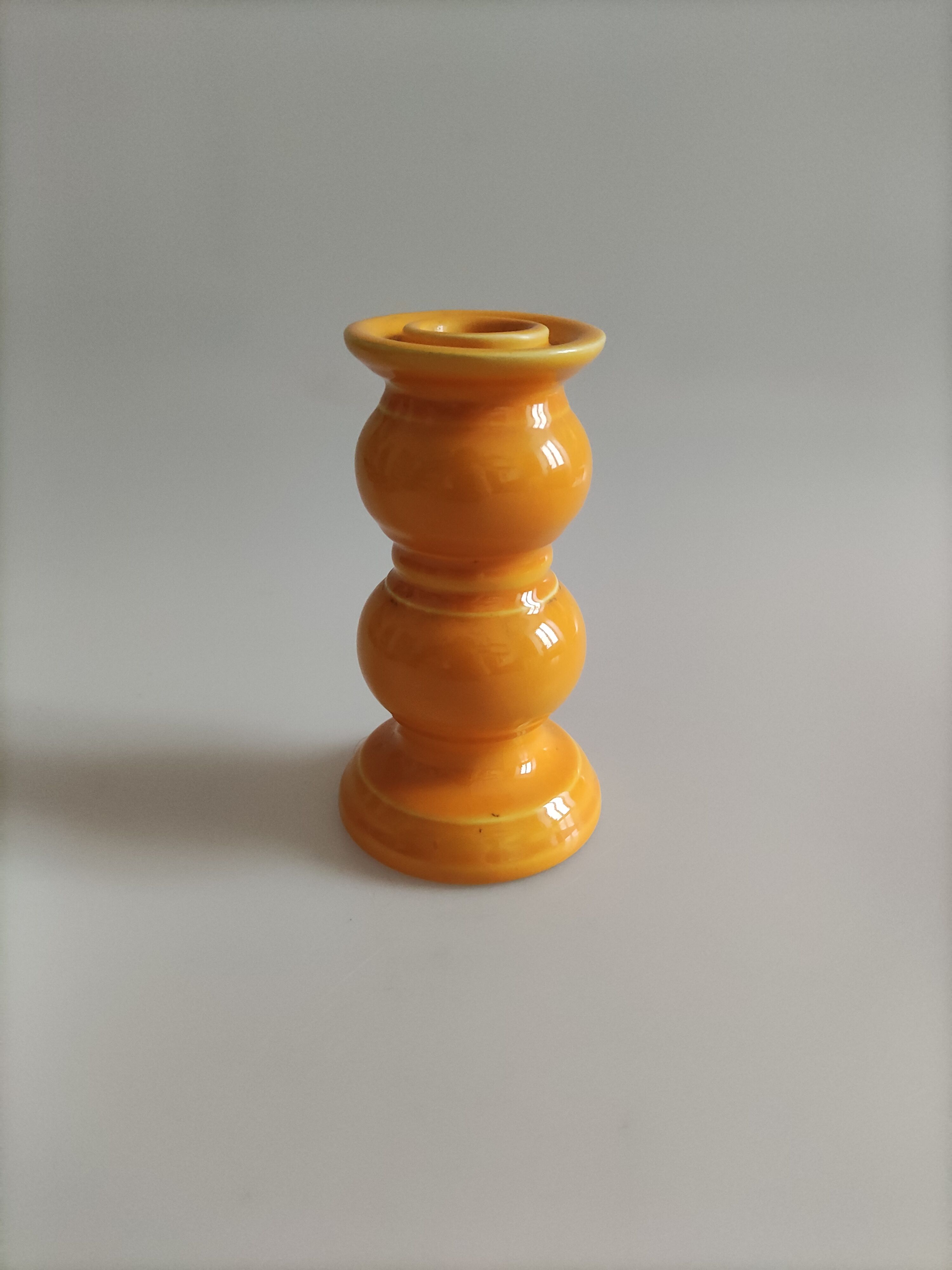 Yellow ceramic candle holder