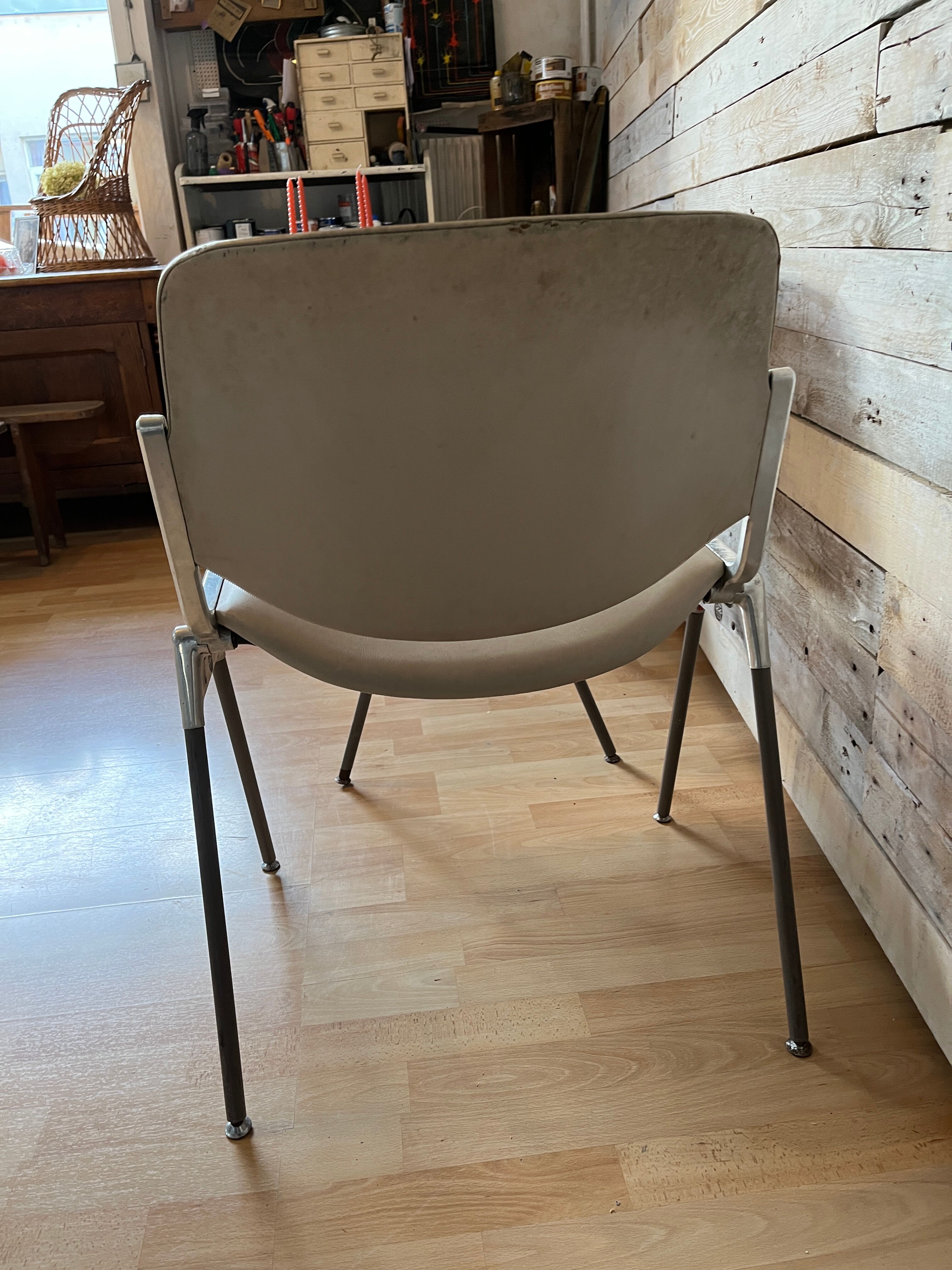 Pair of stackable chairs by Giancarlo Piretti for Castelli