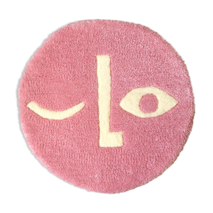 Tapis rond visage rose