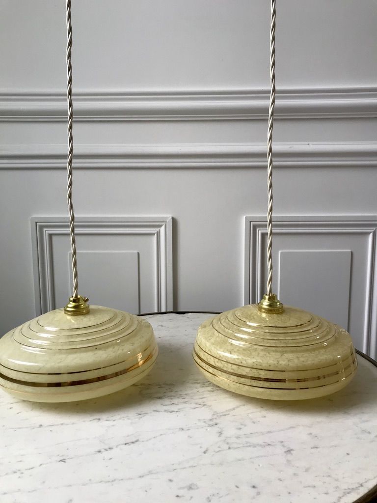 Pair of suspensions in yellow Clichy glass and golden border 40s-50s