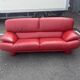 Three-seater red full-grain leather sofa – Vintage Italian design from the years.