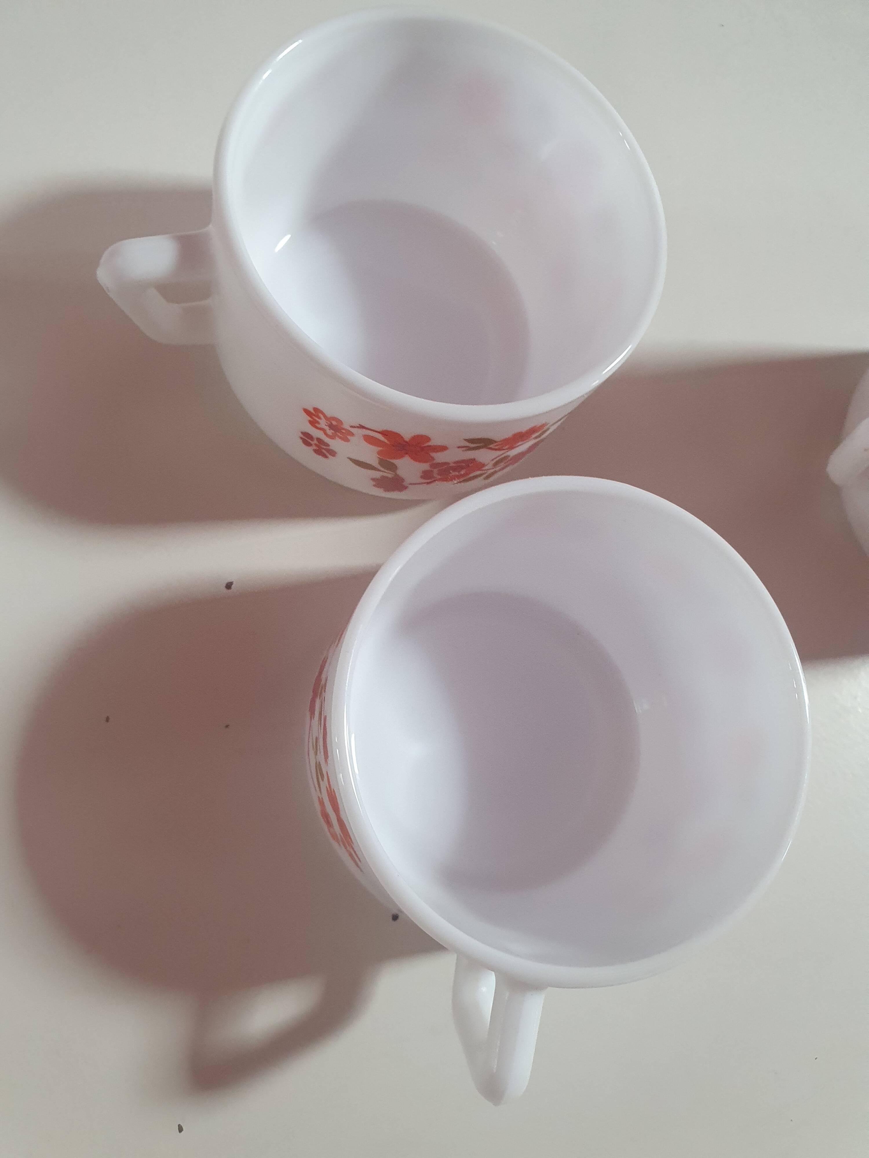 set of 8 small vintage Arcopal Scania cups with small orange liberty flowers from the 70s