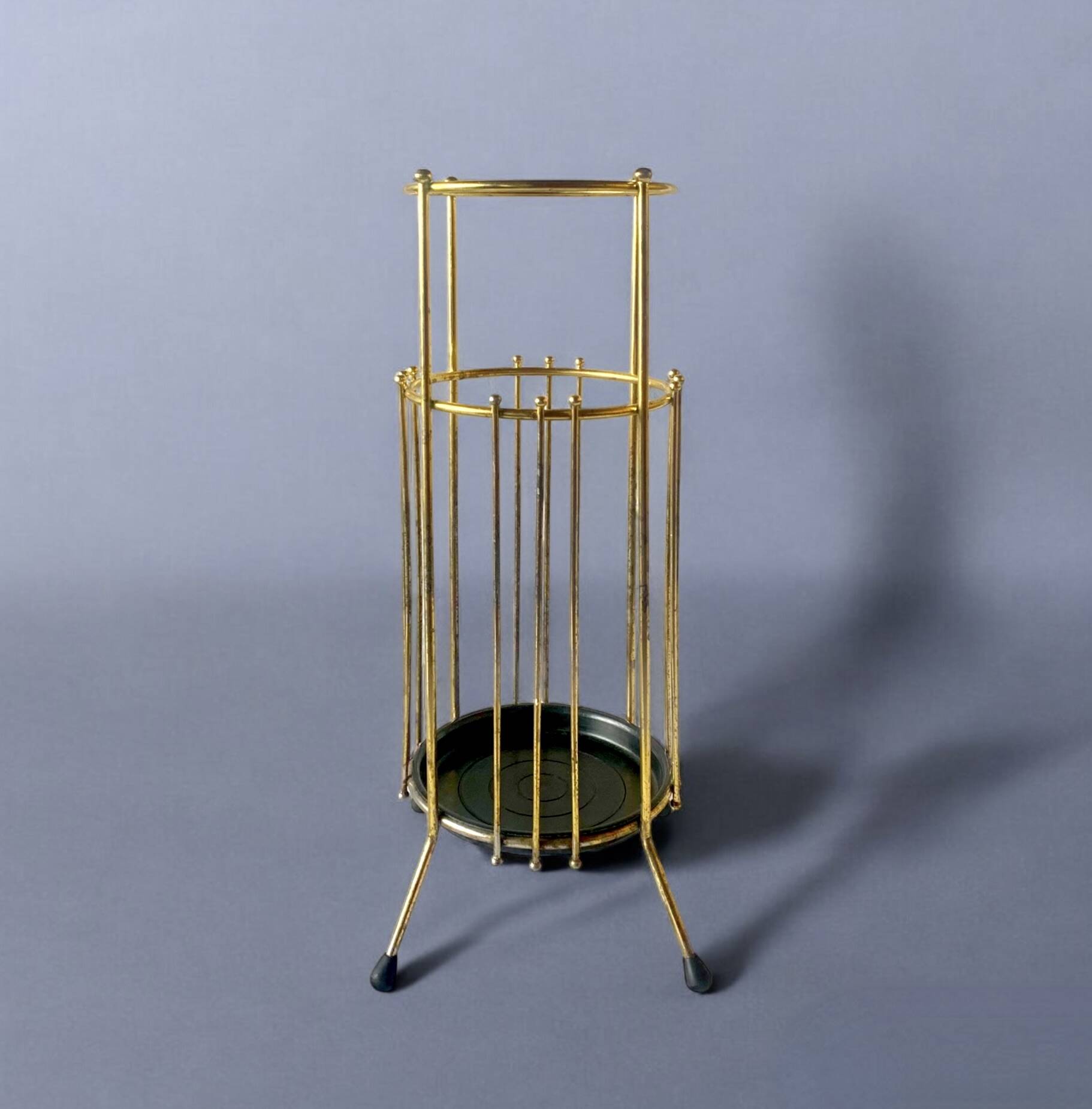 Vintage gold metal umbrella stand