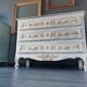 Louis XV style royal chest of drawers patinated