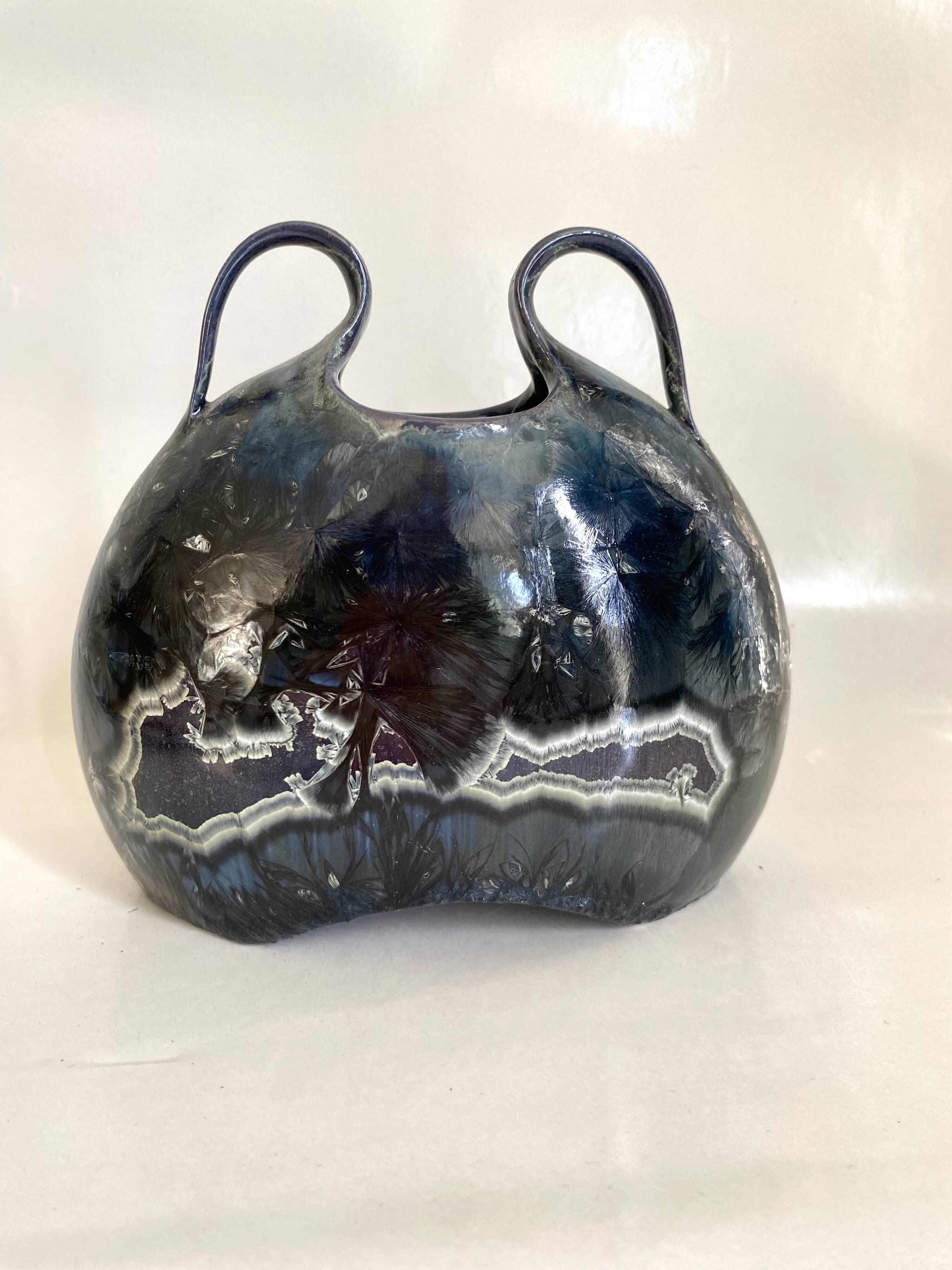 Iridescent ceramic vase with handles