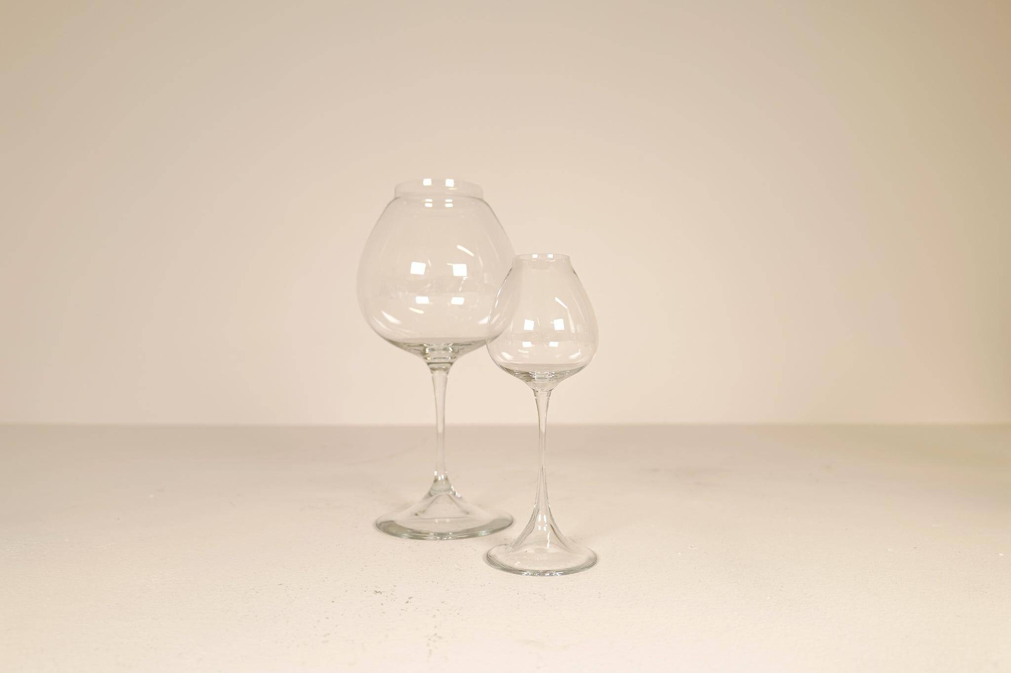 Large collection of Midcentury tulip glasses by Orrefors Nils Landberg, Sweden, 1950s.