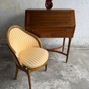 DeCoene antique wood writing desk with beige striped upholstered chair, brass-accented classic set