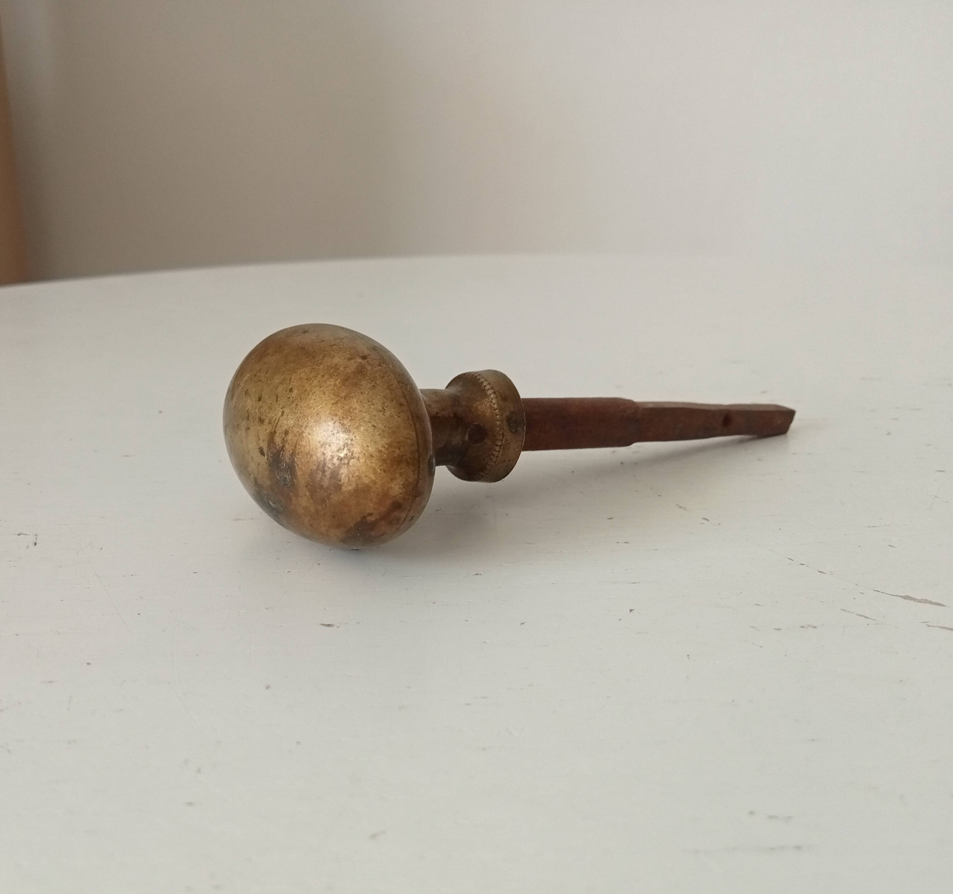 Antique olive door handle from the 19th century.