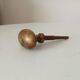 Antique olive door handle from the 19th century.