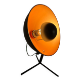 Vintage industrial lamp with a metal frame.