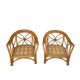 Two large rattan armchairs