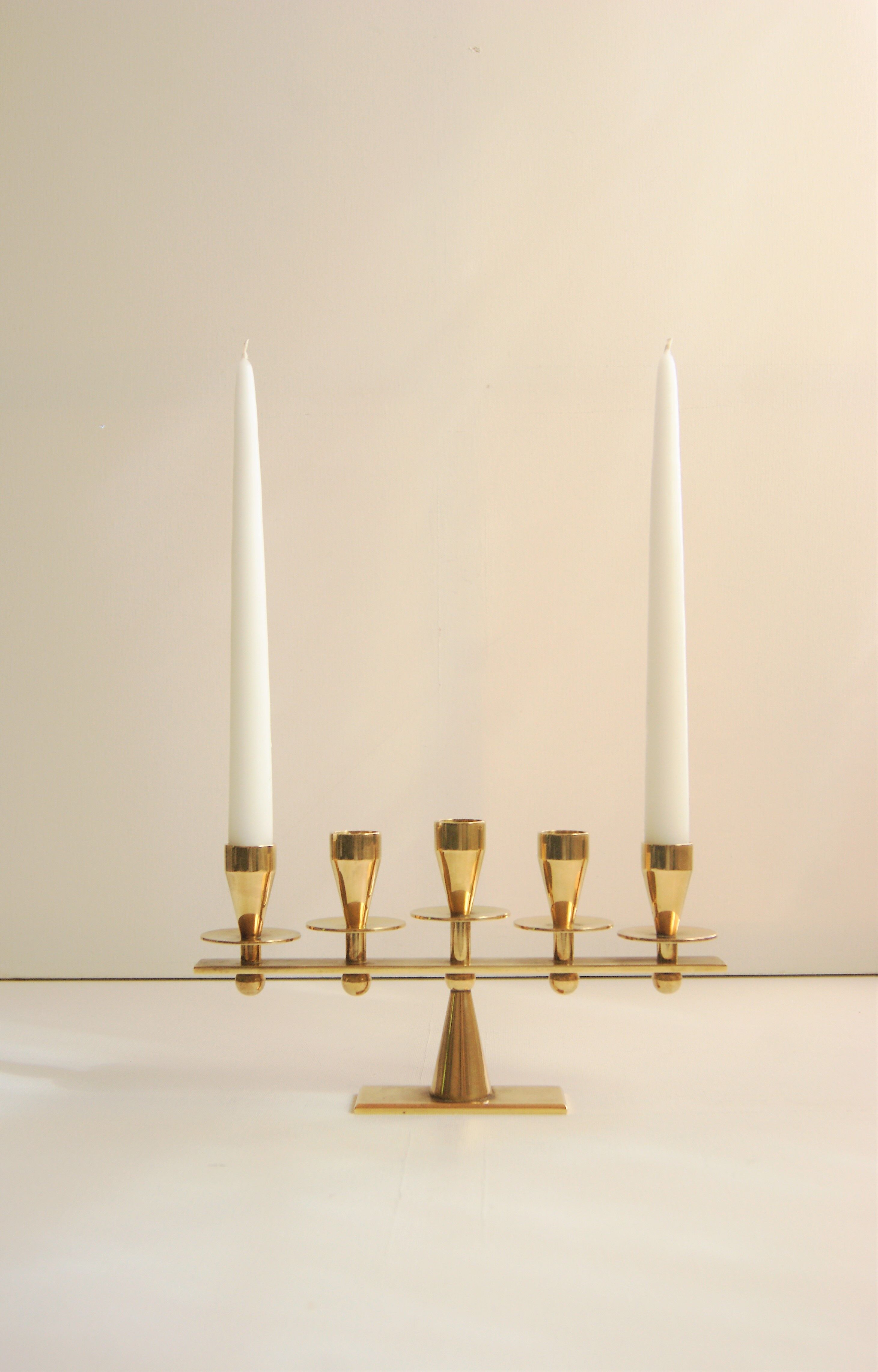 Rare mid-century modern brass candle hold from KARA Denmark 1960s.