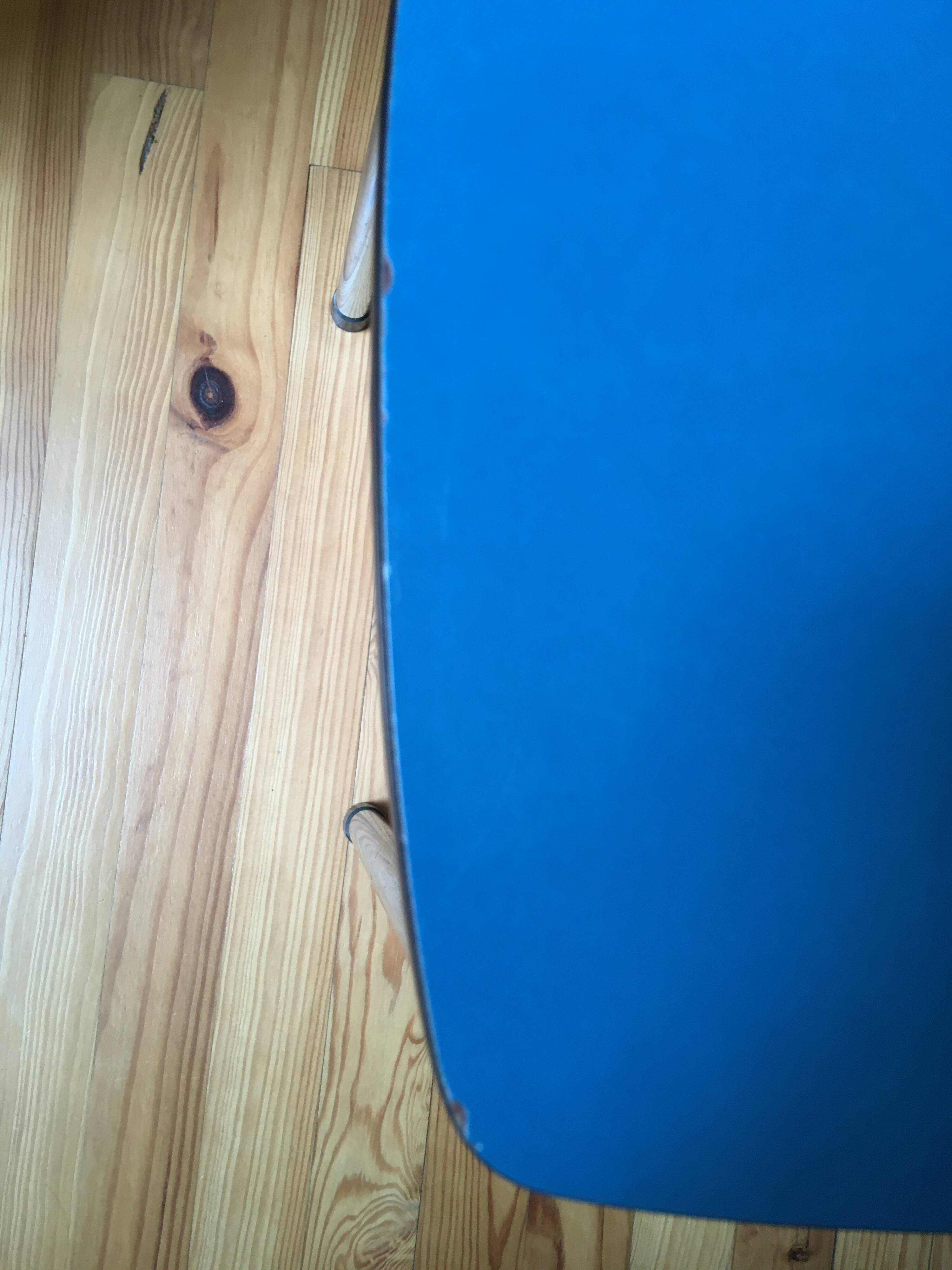 Hard blue formica stool
