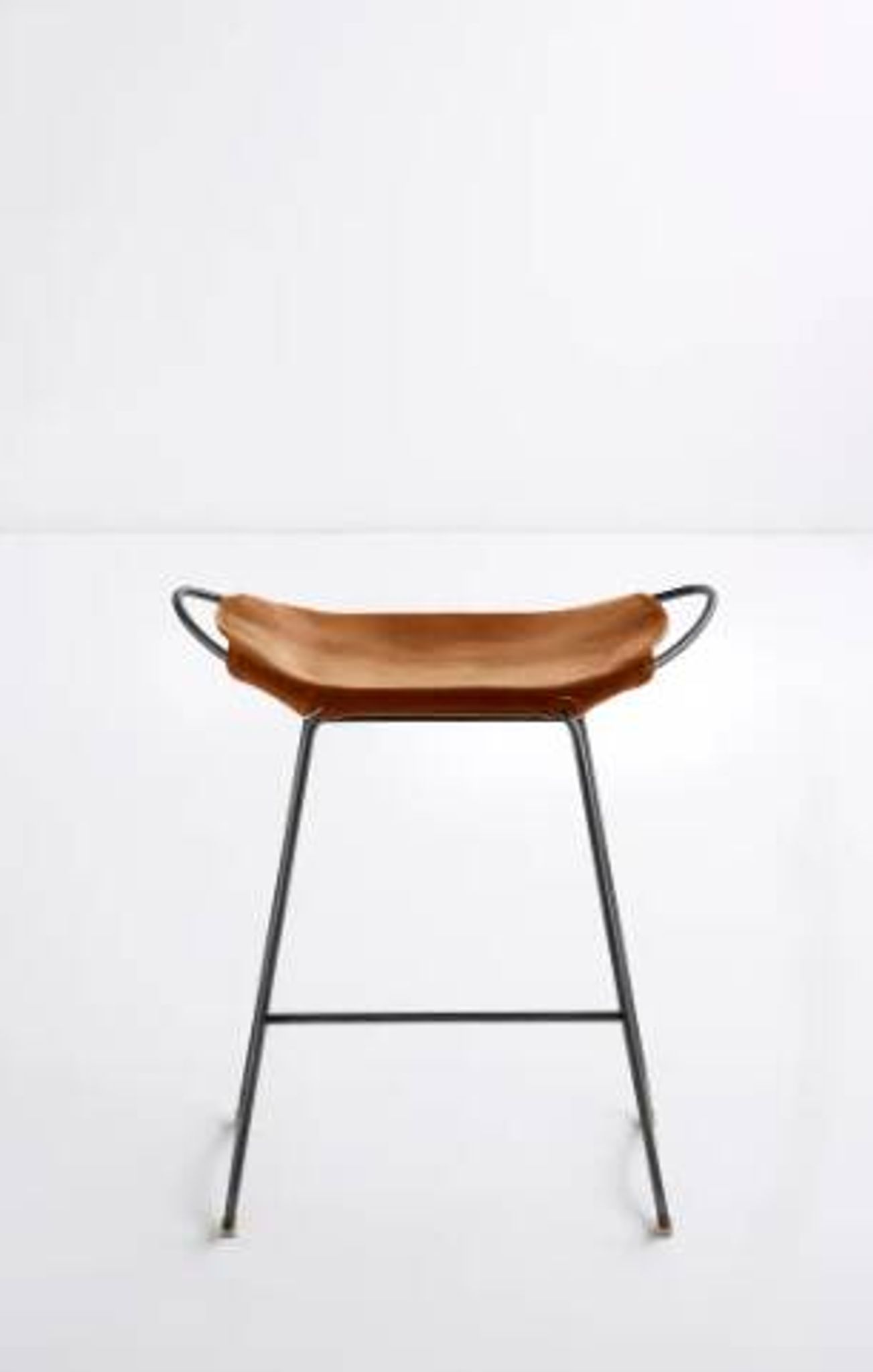 Pair of contemporary bar stools in cognac and smoked black.