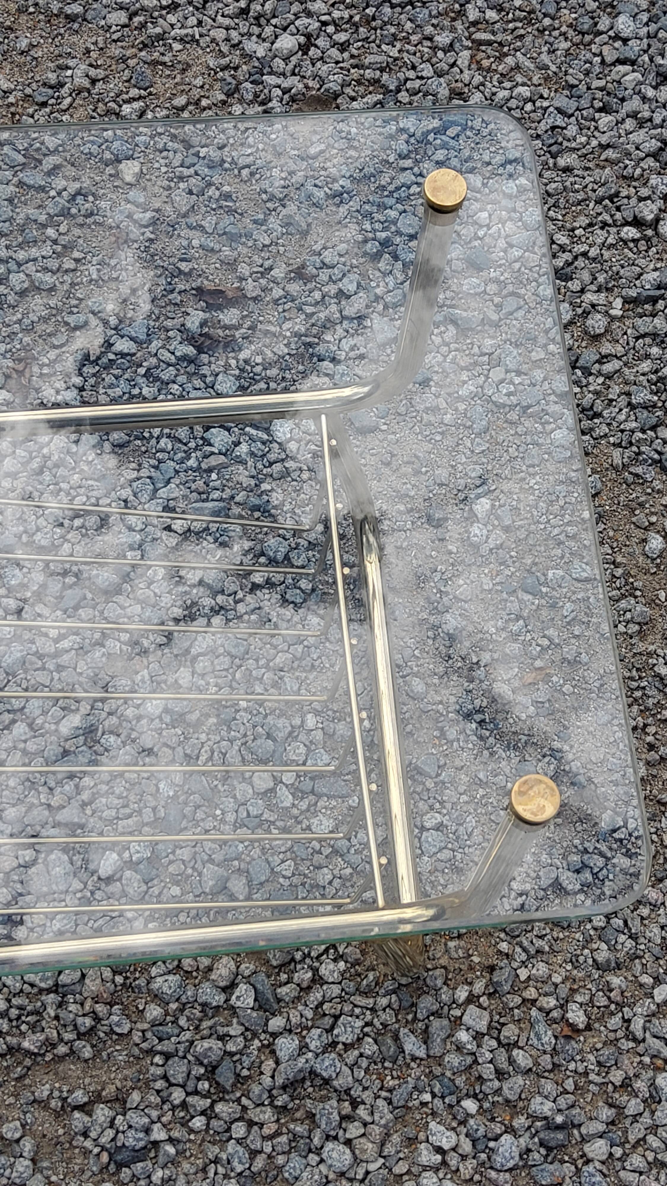 Coffee table from the 60s top glass base metal gilded